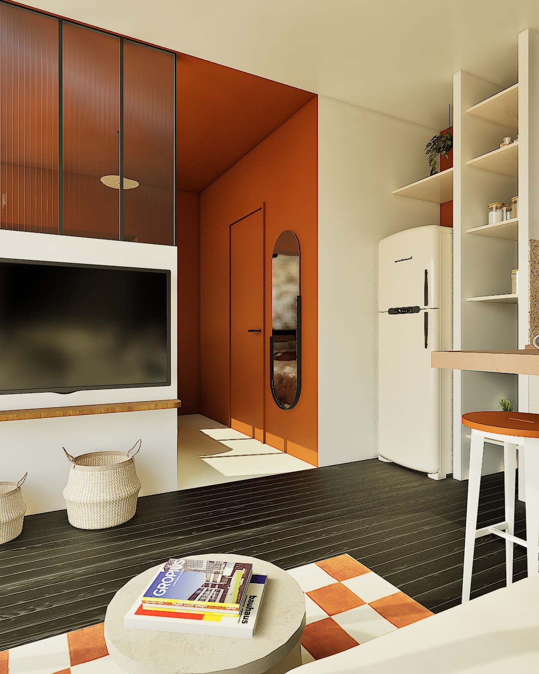 Vue depuis le canapé sur la chambre ouverte et le coin cuisine du studio LERIA rénové avec de la couleur et du parquet noir, dans un esprit vintage et moderne. Plafond et murs peints en Terracotta